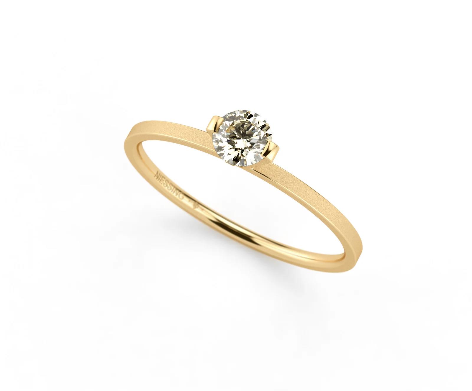 Niessing Princess Solitaire Ring Gelbgold 0,50ct L